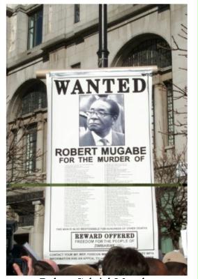 mugabe wanted for murder